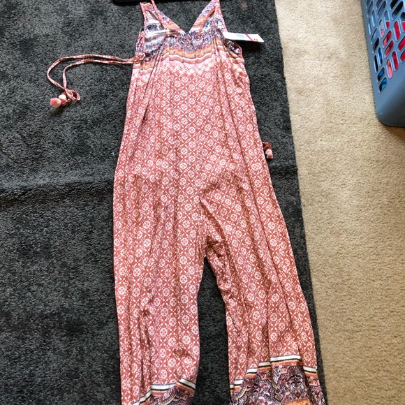 This jumpsuit has never been worn before, brand new still has the price tag - Picture 4 of 5
